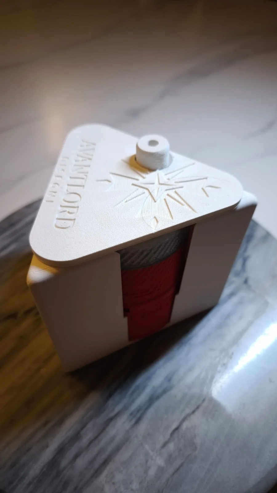 Angled view of the Avantlord WDT tool mounted above an espresso cup.
