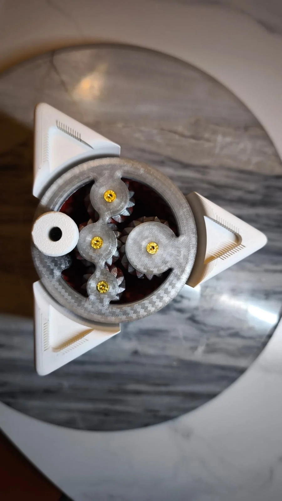 Top view of the Avantlord WDT prototype, showing the circular gear train and triangular supports.