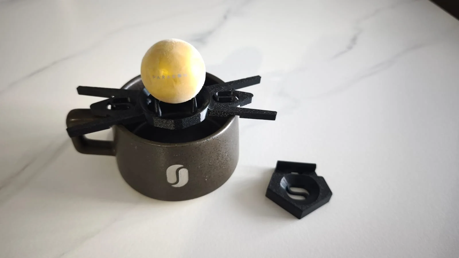 Front view of the El Injerto cup with the 3D-printed interface and Chilling Rock.